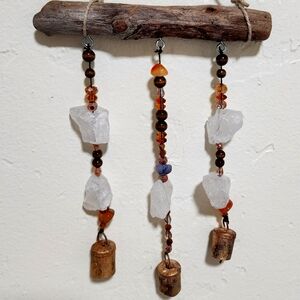 Handcrafted wall hanging or funky garden chimes.